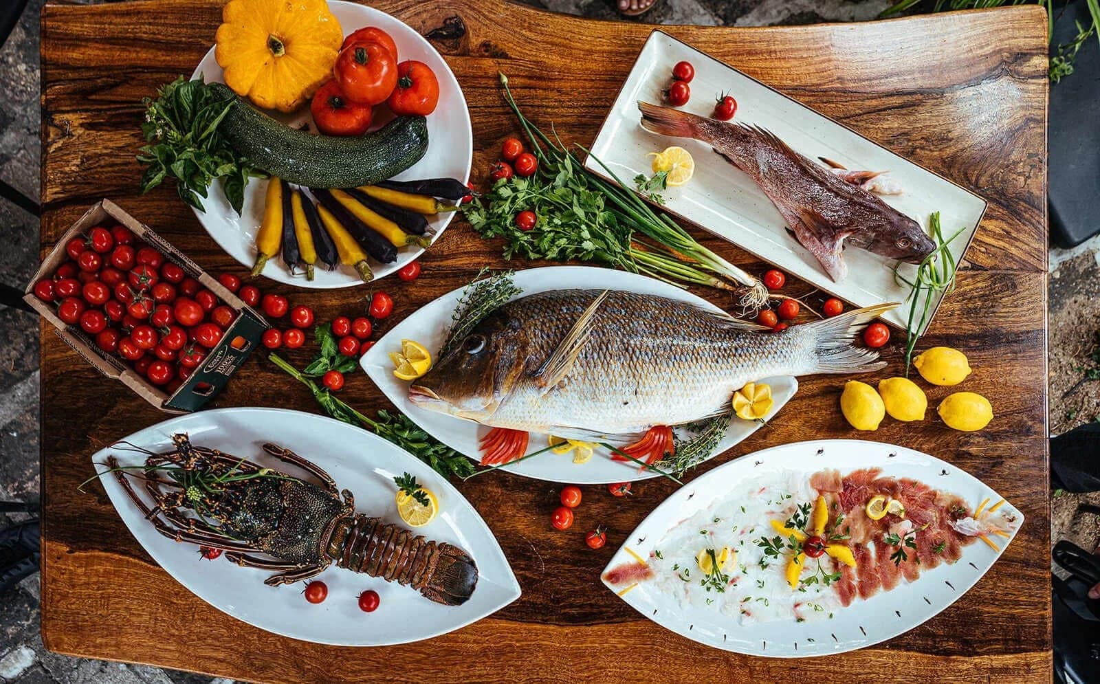 Fish served on a wooden table